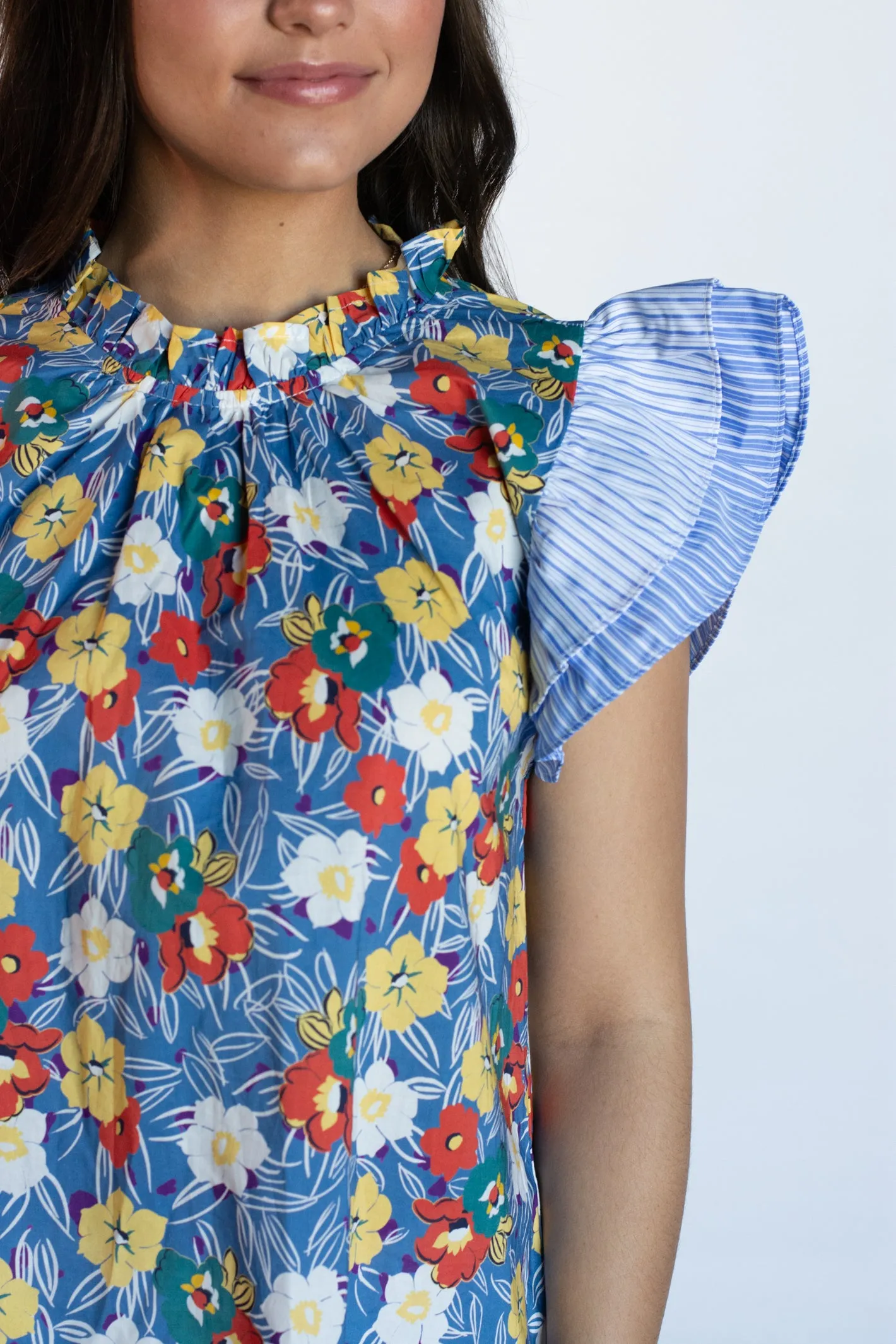 Blue Floral Print Top with Unidentified Words