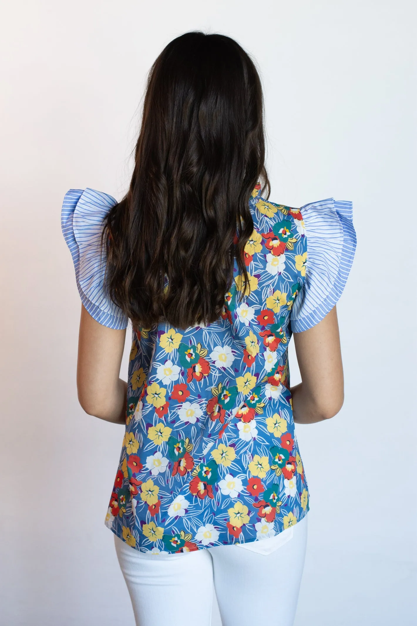 Blue Floral Print Top with Unidentified Words