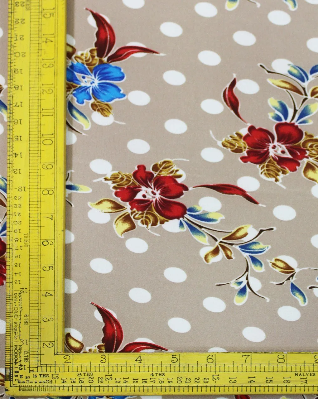 Polyester bubble crepe fabric in dark cream with multicolor floral print