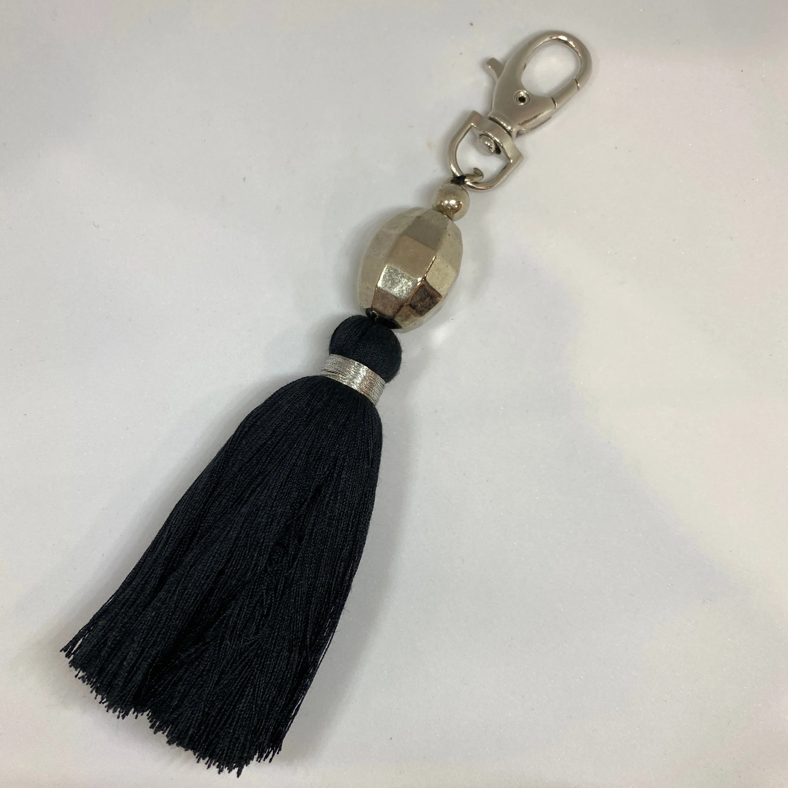 TM. Ball & Tassel Keychain